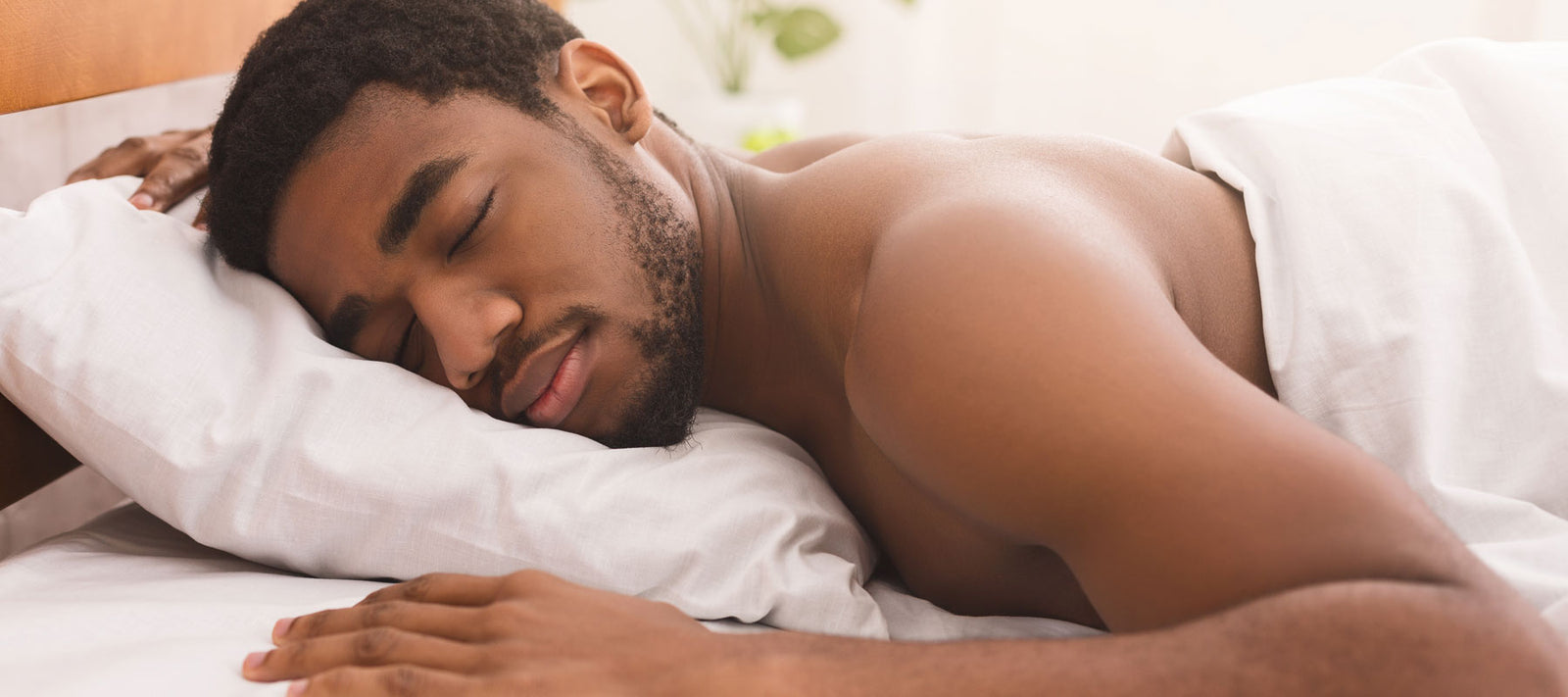 Young Man Sleeping Pillow Legs Which Keeps His Pelvis Neutral