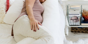 pregnant woman on medcline body pillow